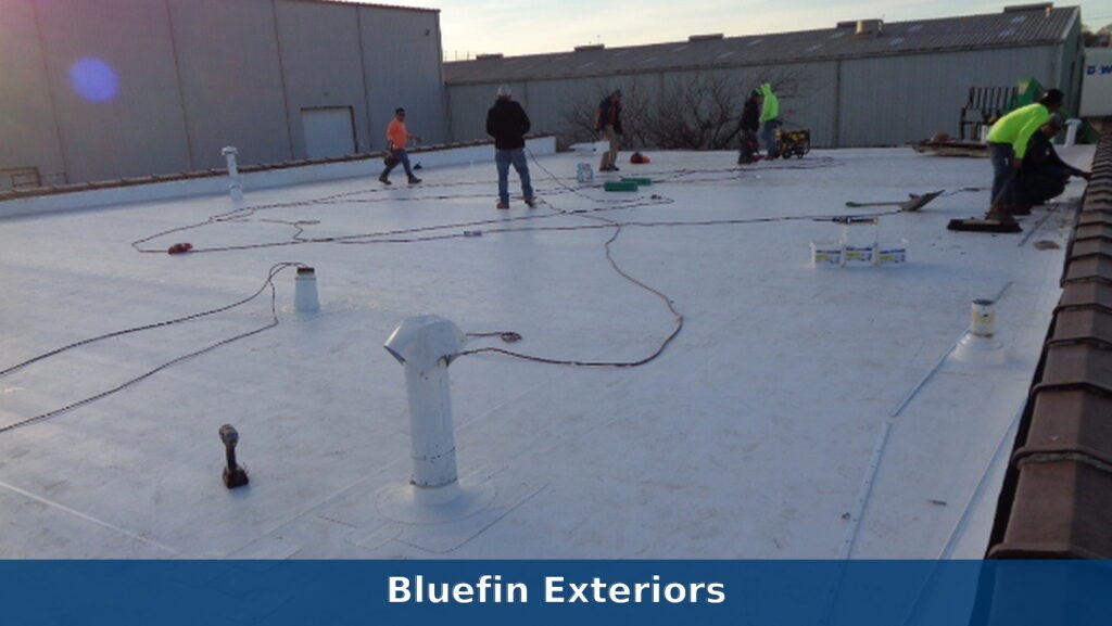 Bluefin Exteriors crew installing a TPO commercial roof in Birmingham, Alabama